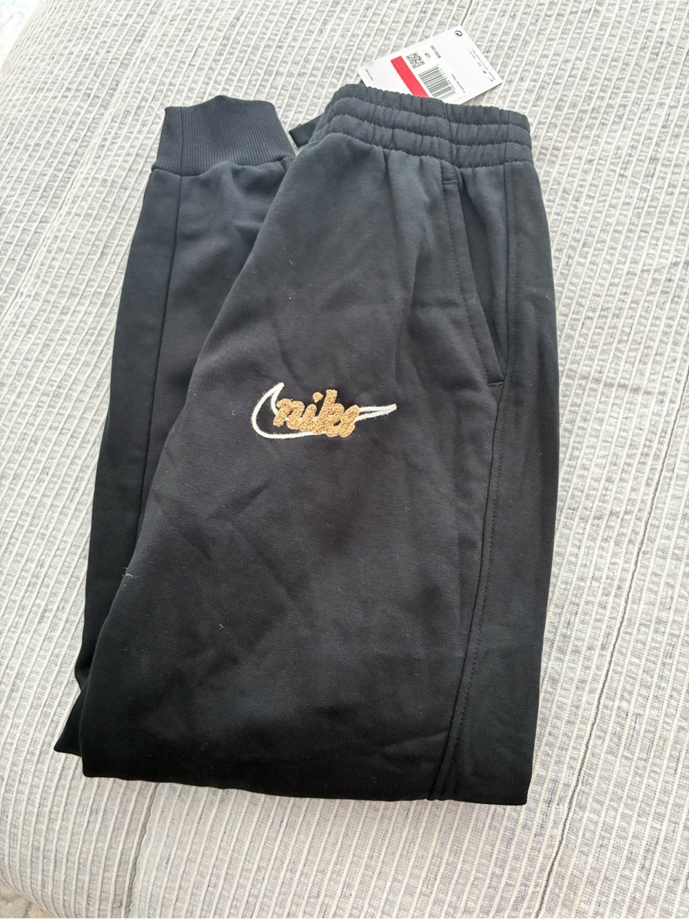 Nike Kids Black Jogger Sweatpants with Gold Script Logo